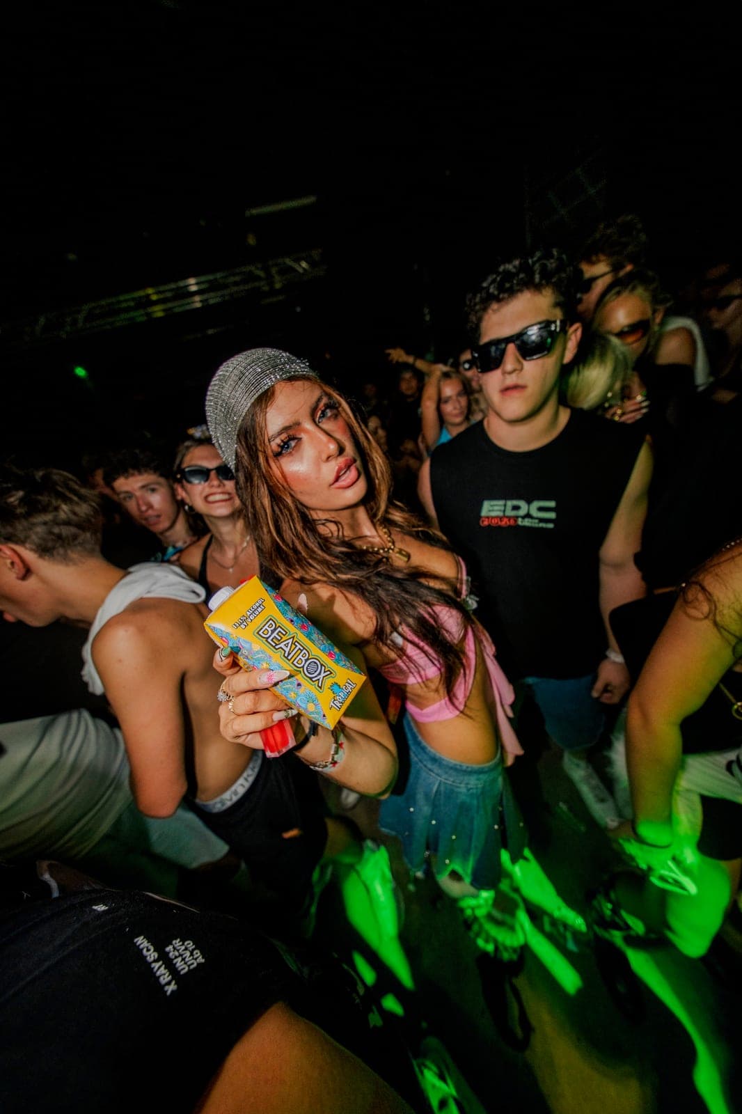 Student in the crowd with a BeatBox at a sponsored festival activation